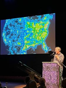 Ken Walczak, Adler Planetarium and Dark Sky Interntional Board Member,  illustrates the extent of light pollution in the United States. Photo Courtesy of Cynthia Hector Johnson