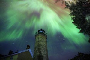 It's rare to catch Aurora over the Southhead Lighthouse because there is not much of a north view there and Aurora appears only in the strongest solar storms. Photo Courtesy of Cynthia Hector Johnson