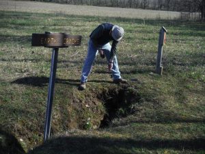 earth crack warning sign Alpena Michigan karst