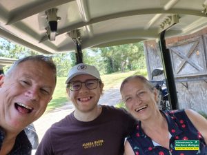 Guy, Casey and Marisa golfing at Northern Michigan University Golf Course