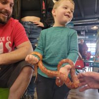 Holding a snake at Cognition in Beulah Michigan
